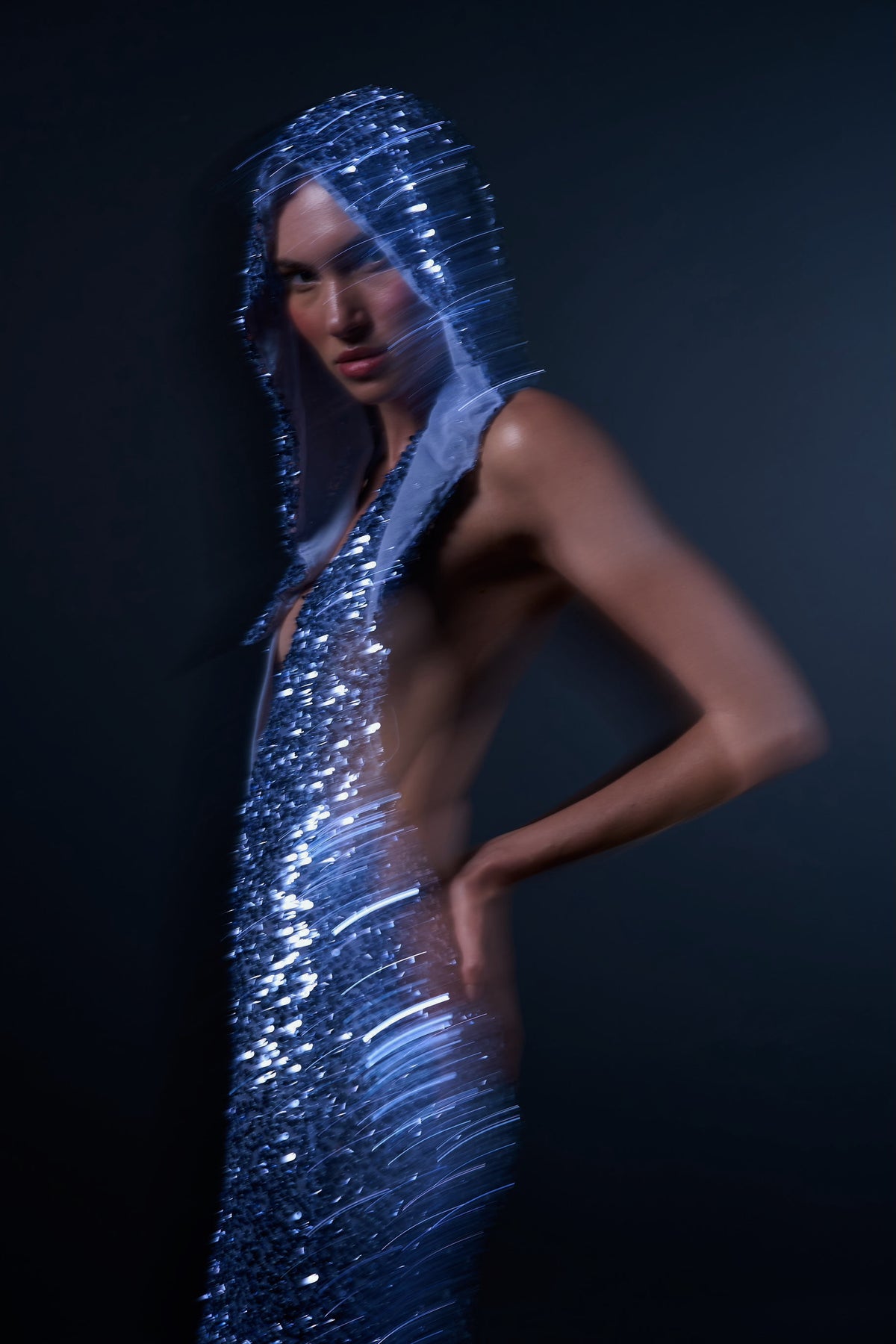 HOODED SEQUIN GOWN